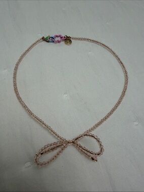 Susan Alexandra Pale Pink Beaded Bow Necklace